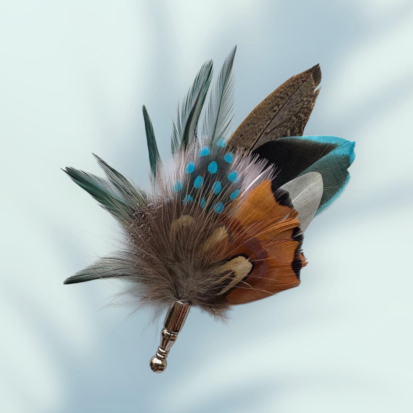 Teal, white, pink and natural feather Lapel pin in a silver clasp CFLP201